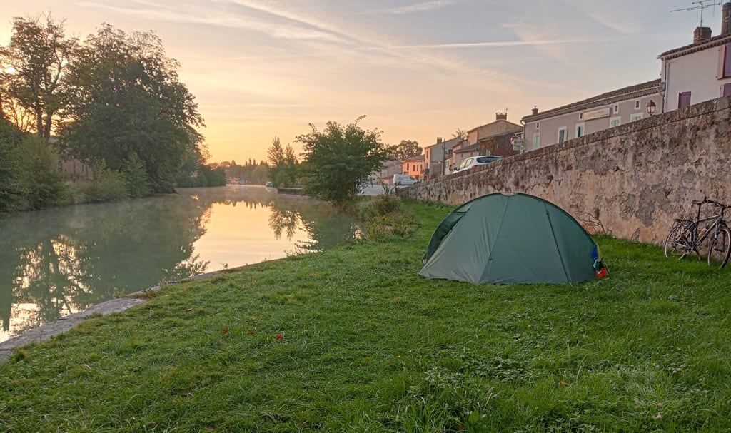 Sunrise with a tent in France